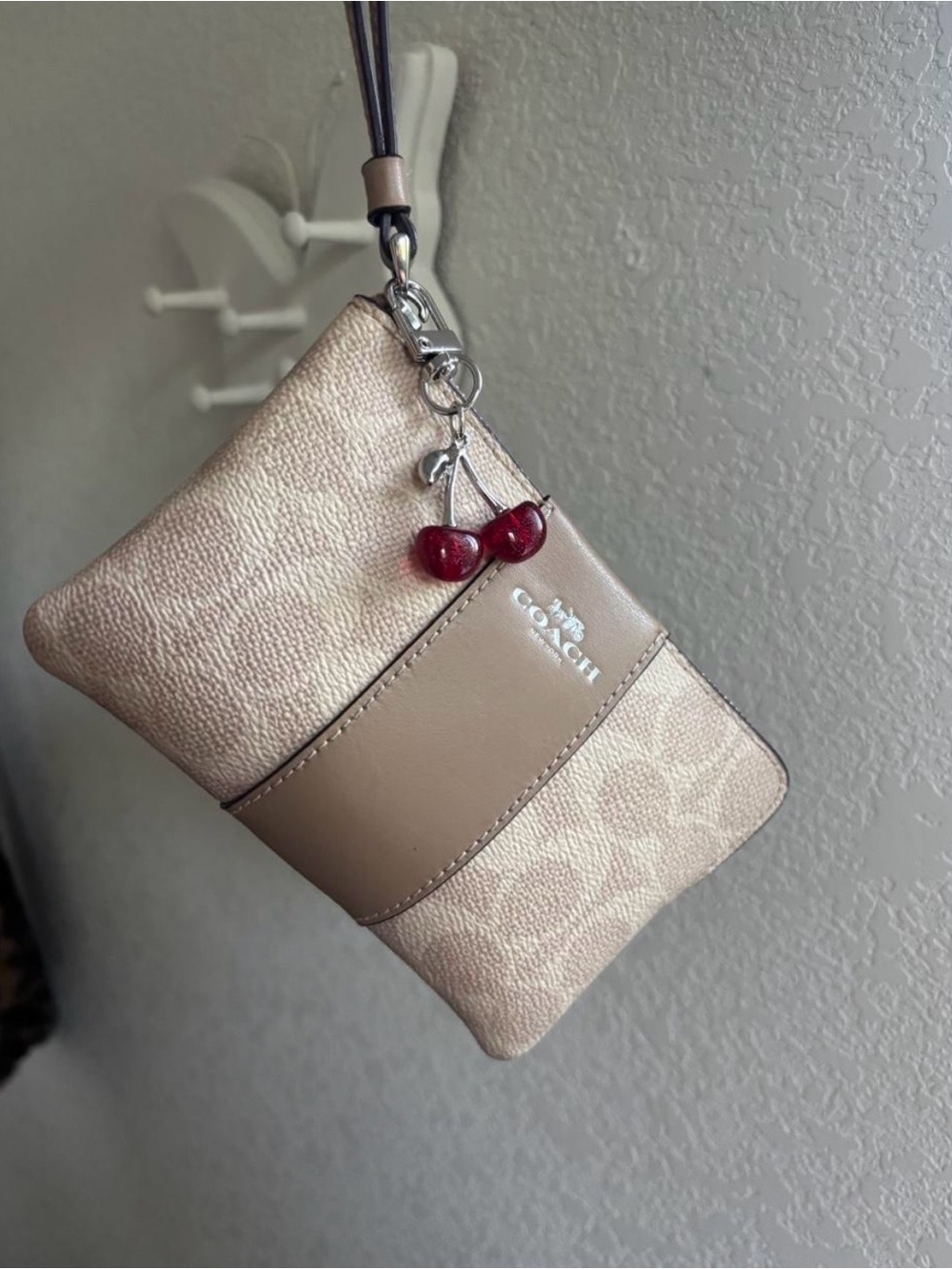 Coach cream& tan leather wristlet